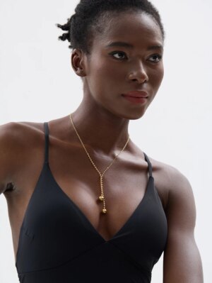 collier ras de cou boule d'or